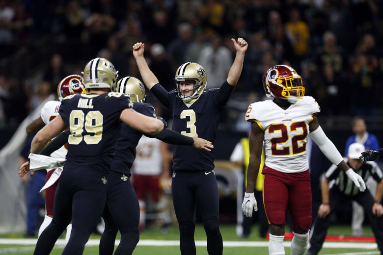 New Orleans Saints kicker Wil Lutz (3) celebrates his game winning field goal during overtime of an NFL football game against the Washington Redskins in New Orleans, Sunday, Nov. 19, 2017. The Saints won 34-31.(AP Photo/Butch Dill)