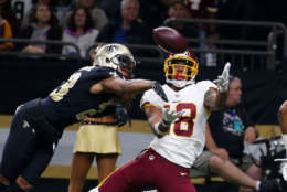 New Orleans Saints cornerback Marshon Lattimore (23) breaks up a pass intended for Washington Redskins wide receiver Josh Doctson (18) in the first half of an NFL football game in New Orleans, Sunday, Nov. 19, 2017. (AP Photo/Butch Dill)