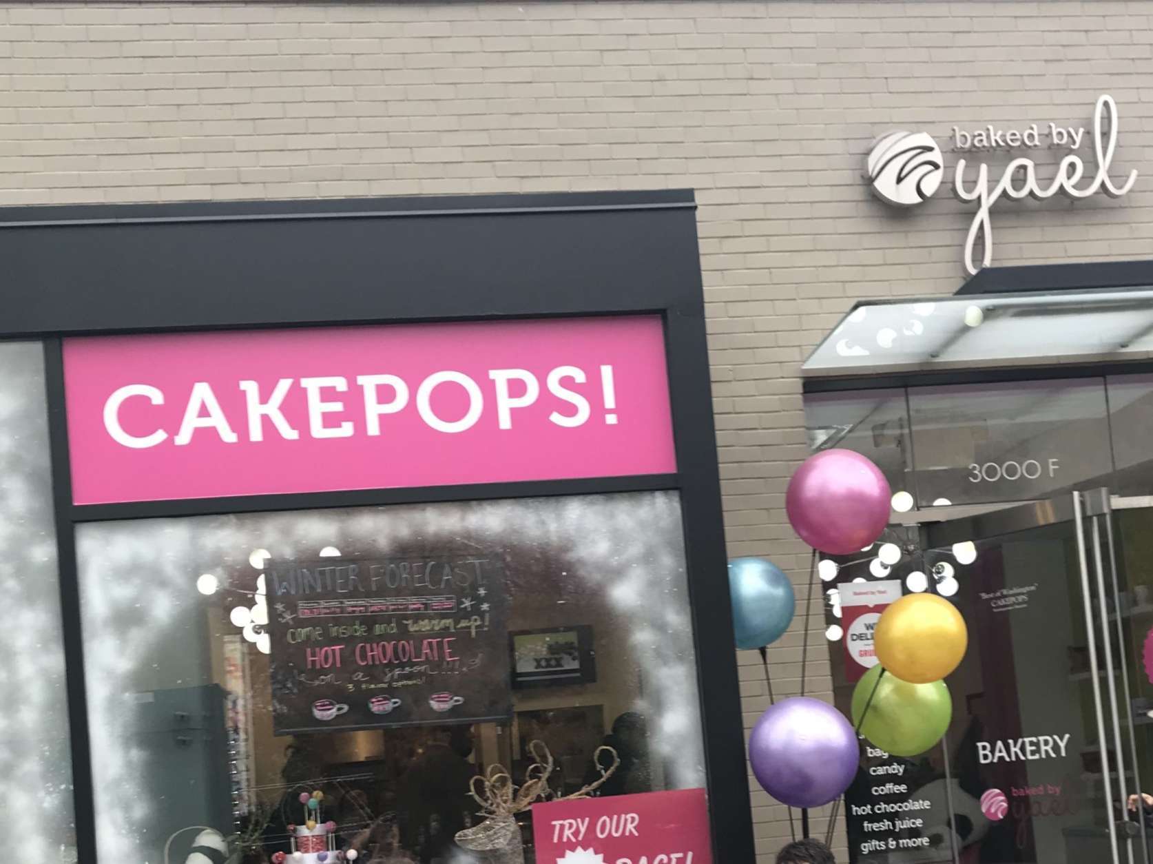 "We make everything from scratch, all of our cake pops, bagels, black and white cookies and everything else," said owner Yael Krigman, a lawyer, who left a big D.C. law firm to start her bakery business several years ago, "We've grown from one employee to almost three dozen employees. The vast majority are D.C. residents," she said. (WTOP/Dick Uliano) 