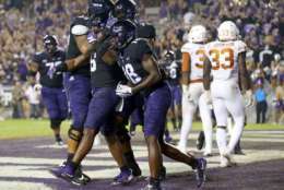 FORT WORTH, TX - NOVEMBER 04:  The TCU Horned Frogs celebrate the fourth quarter touchdown by Darius Anderson (6) of the TCU Horned Frogs against the Texas Longhorns at Amon G. Carter Stadium on November 4, 2017 in Fort Worth, Texas.  (Photo by Richard W. Rodriguez/Getty Images)