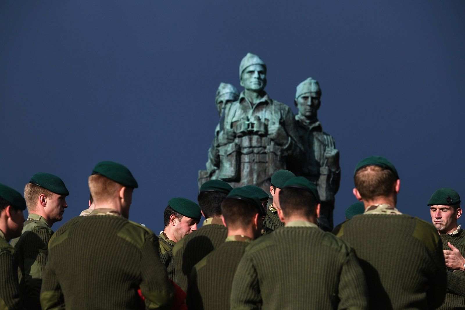 SPEAN BRIDGE, UNITED KINGDOM - NOVEMBER 11:  Serving servicemen and veterans gather at Commando Memorial, Spean Bridge where they observed a two minute silence as a mark of respect for the war dead on November 11, 2017 in Spean Bridge, Scotland. Armistice Day traditionally marks the end of the WWI when Germany and the allied forces signed the armistice signaling the end of hostilities on the Western Front. The cessation of the war officially took effect on the eleventh hour of the eleventh day of the eleventh month and is marked annually by services of remembrance for all those who have fallen in wars and a two minute silence.  (Photo by Jeff J Mitchell/Getty Images)
