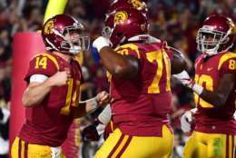 LOS ANGELES, CA - NOVEMBER 18:  Sam Darnold #14 of the USC Trojans reacts to his touchdown to take a 21-7 lead over the UCLA Bruins during the third quarter at Los Angeles Memorial Coliseum on November 18, 2017 in Los Angeles, California.  (Photo by Harry How/Getty Images)