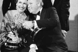 FILE - In this Sept. 18, 1978 file photo, actors Jean Stapleton, seated left, and Carroll O'Connor, seated right, hold their Emmys as they pose with Rob Reiner,  standing from left, who won an Emmy for supporting actor in the same series, show producer Norman Lear and executive producer Mort Lachman. Lear released a new memoir, "Even This I Get To Experience." (AP Photo, File)