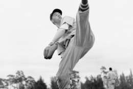 FILE- In this Feb. 28, 1941, file photo, Cleveland Indians star pitcher Bob Feller works on his form during spring training baseball in Fort Myers, Fla. Feller, the Iowa farm boy whose powerful right arm earned him the nickname "Rapid Robert" and made him one of baseball's greatest pitchers during a Hall of Fame career with the Indians, has died Wednesday, Dec. 15, 2010. He was 92.  (AP Photo/File)