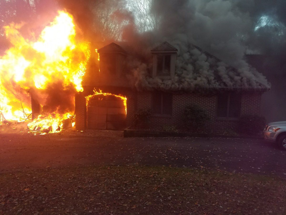 Photo shows flames of a house fire