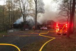 photo shows smoke of a house fire
