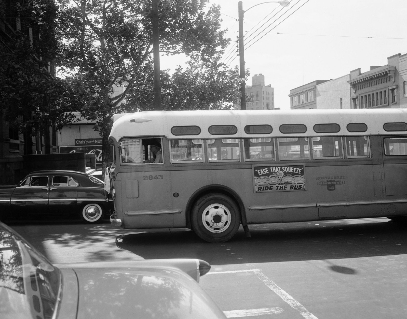 FILE - In this April 26, 1956, file photo, a bus driver is all alone as his empty bus moves through downtown Montgomery, Ala, as a boycott continues even though the bus company has ordered an end to segregation. The 60th anniversary of the Montgomery bus boycott is widely credited with helping spark the modern civil rights movement. (AP Photo/Horace Cort, file)