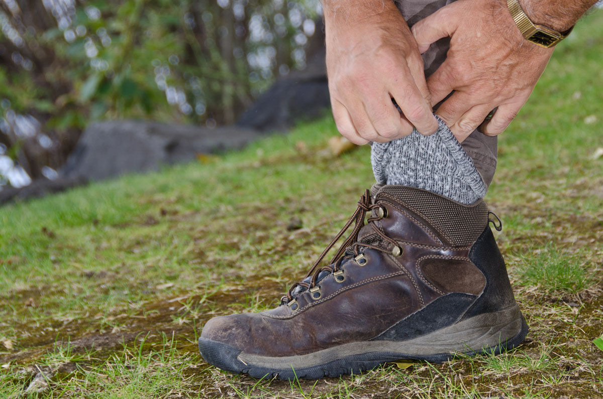 Protecting Against Ticks by Tucking Pants into Socks (Thinkstock)