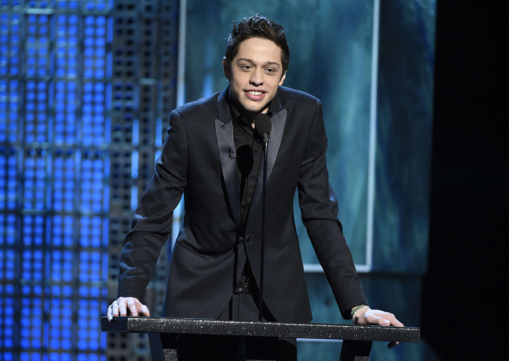 FILE - In this March 14, 2015, file photo, Pete Davidson speaks at a Comedy Central Roast at Sony Pictures Studios in Culver City, Calif. The "Saturday Night Live" cast member said on Instagram Monday, March 6, 2017, that he  has quit drugs and is “happy and sober for the first time in 8 years.” (Photo by Chris Pizzello/Invision/AP, File)