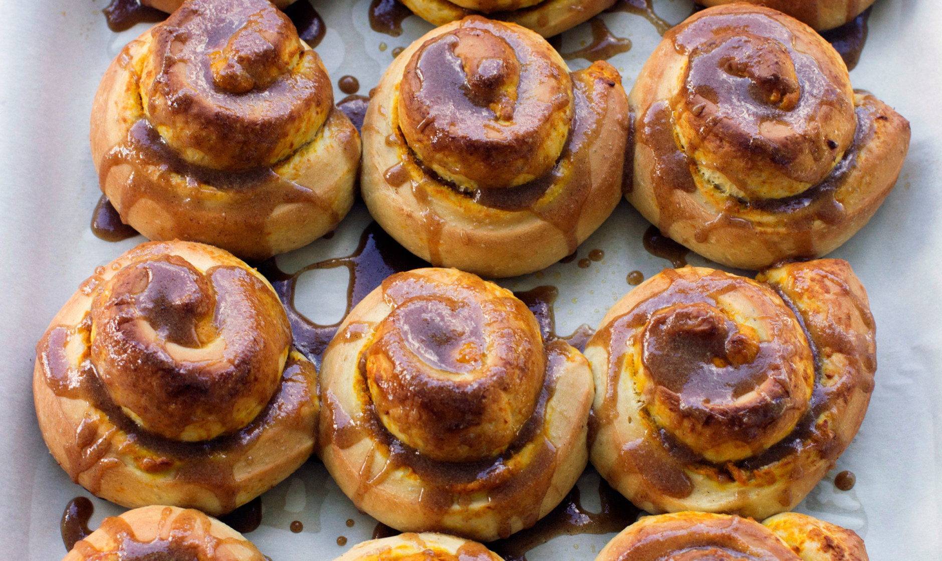 This Sept. 8, 2014 photo shows salted caramel pumpkin buns in Concord, N.H.The bun combines two classics, pumpkin pie and a cinnamon bun, which is topped with a homemade caramel sauce. (AP Photo/Matthew Mead)