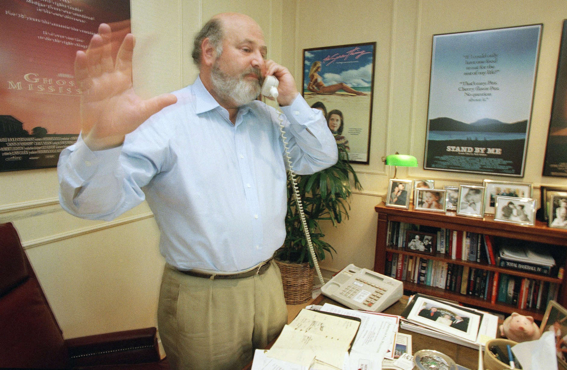 Rob Reiner talks on the phone at his Beverly Hills office at Castle Rock Enterprises, seeking donations for anti-smoking campaigns, July 29, 1988. (AP Photo/Reed Saxon)