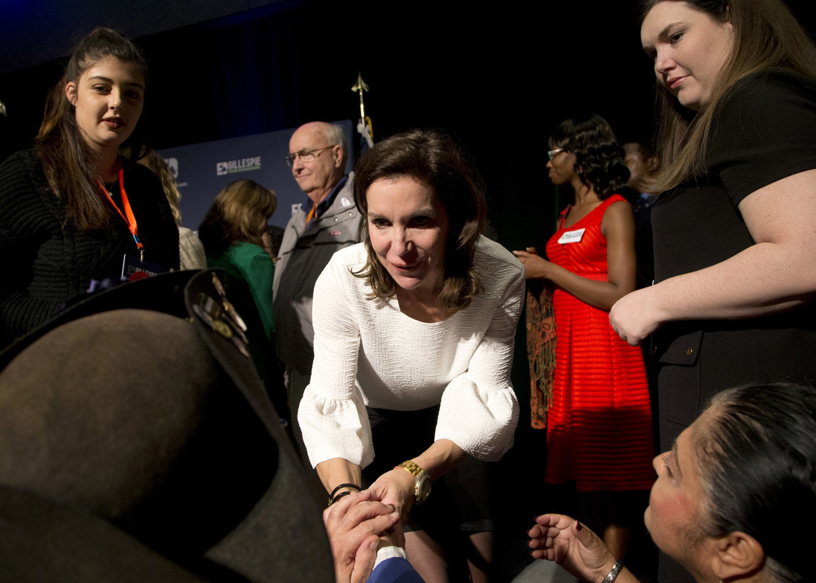 Republican candidate for Lt. Gov. State Sen. Jill Vogel, center, greets supporters after a concession speech during an election party in Richmond, Va., Tuesday, Nov. 7, 2017. Vogel lost to Democrat Justin Fairfax. (AP Photo/Steve Helber)