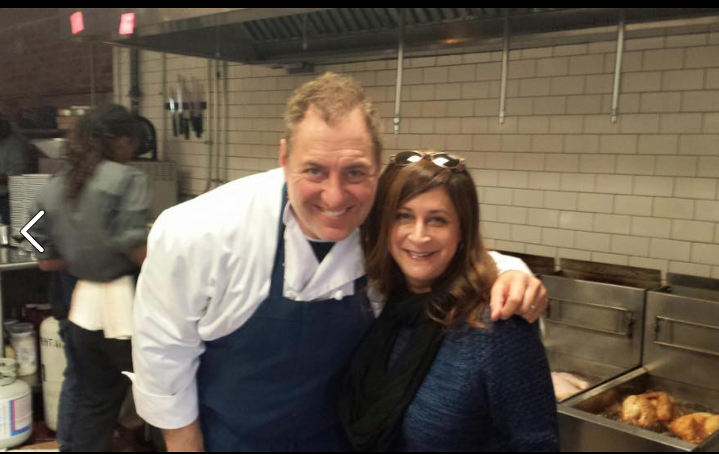 As Thanksgiving turkeys fry in the background, WTOP's Deborah Feinstein visits the kitchen with Medium Rare co-owner Mark Bucher on a previous Thanksgiving Day. (Courtesy Mark Bucher)