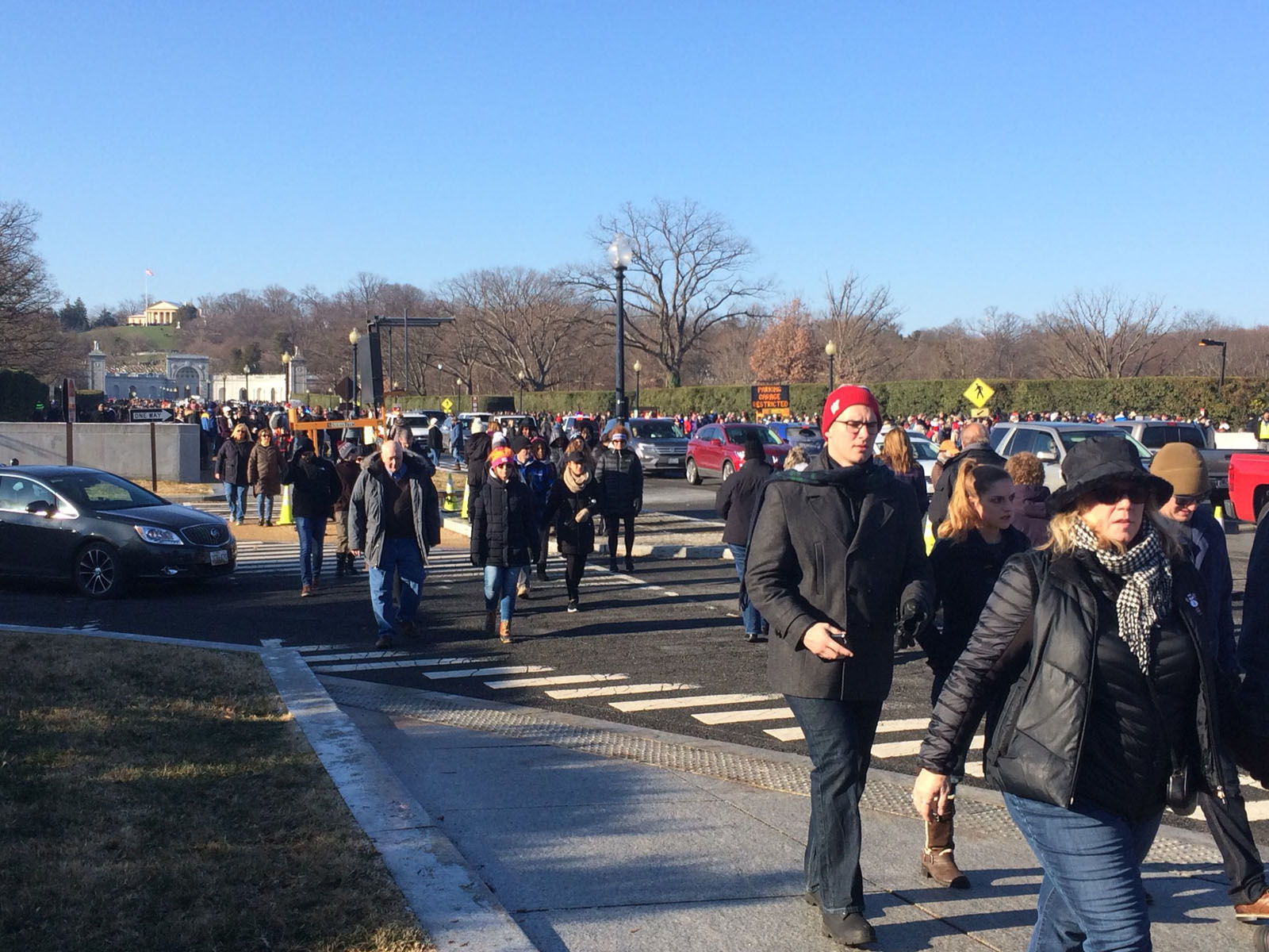 The weather was chilly but that didn't stop huge crowds from heading to Arlington National Cemetery to help out with the annual wreath laying Saturday. (WTOP/Nick Iannelli)