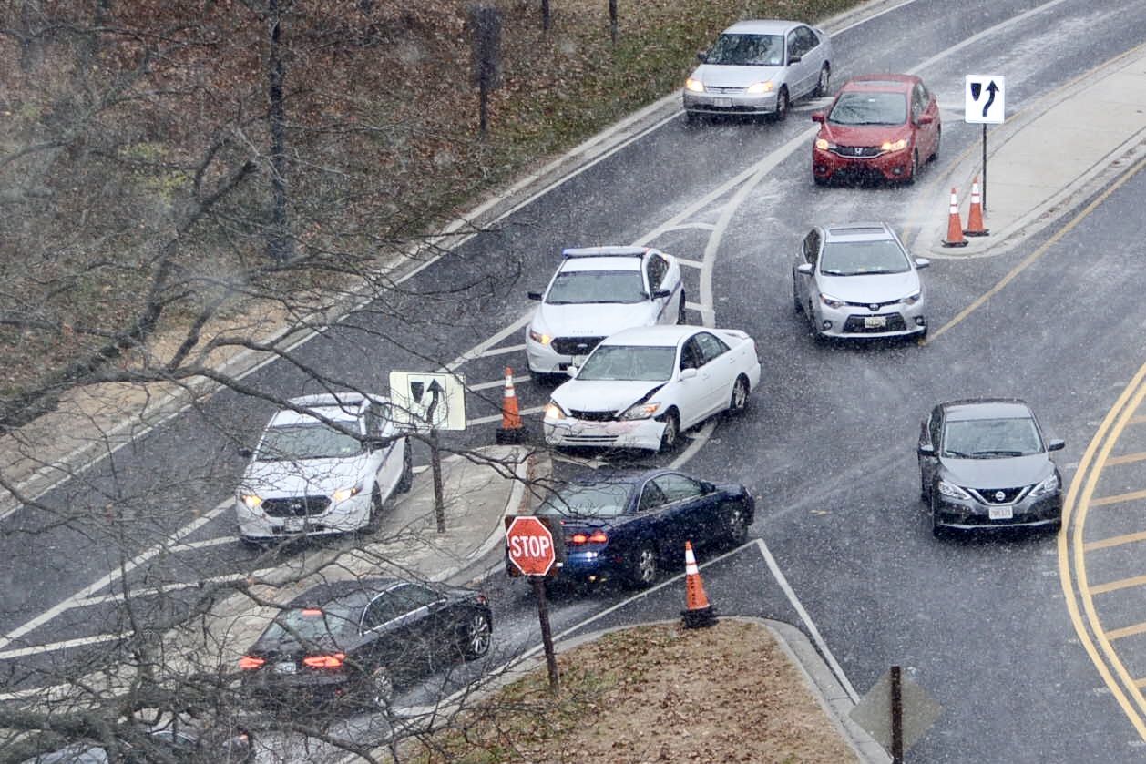 Be careful out there: even with little accumulation, roads are slick, as evidenced by this crash on on Rock Creek Parkway near Calvert Street and Beach Drive. (WTOP/Dave Dildine)