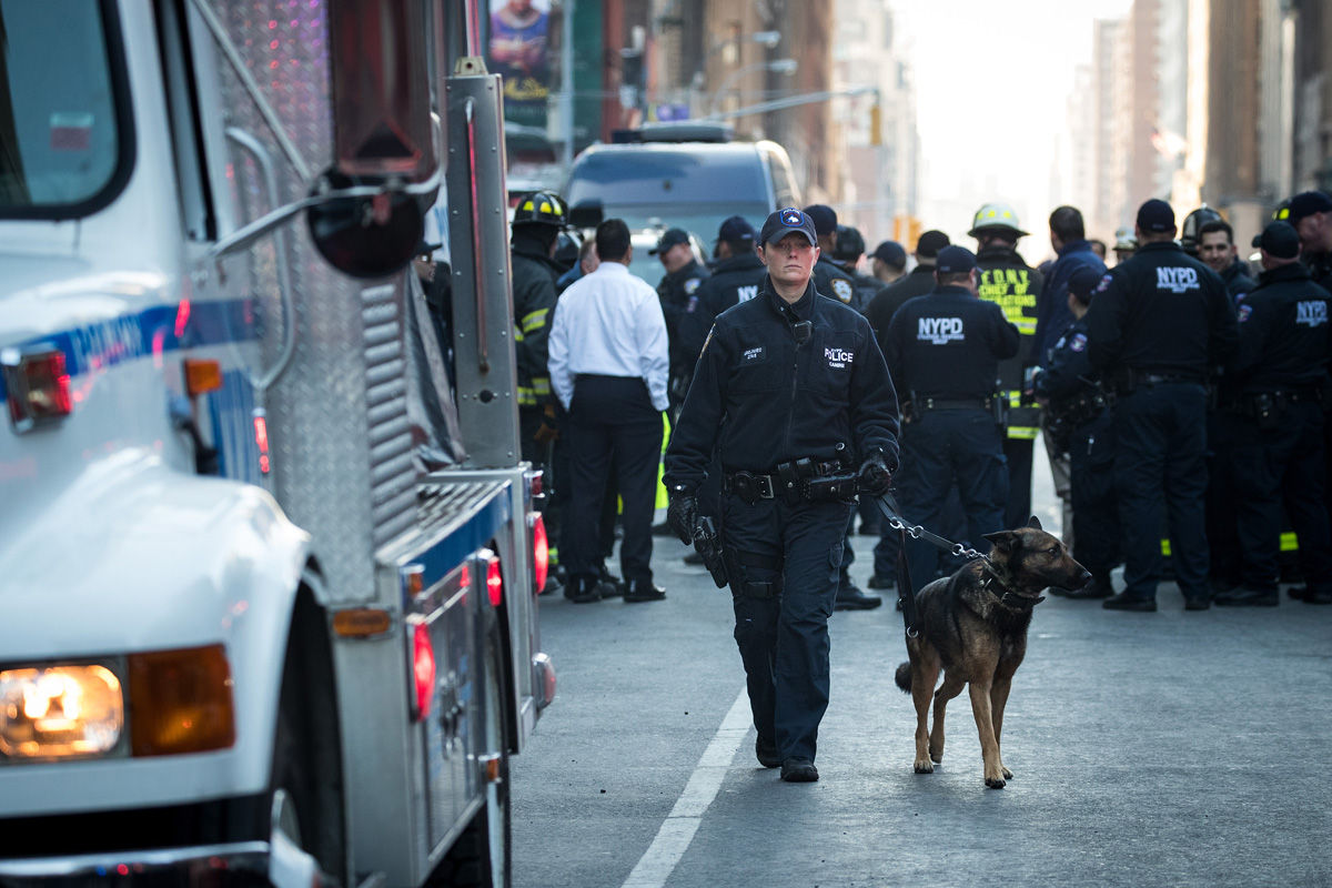  New York City Police Department officers and other first responders work the scene near the New York Port Authority Bus Terminal, December 11, 2017 in New York City. The Police Department said that one person was in custody for an attempted terror attack after an explosion in a passageway linking the Port Authority Bus Terminal with the subway. (Photo by Drew Angerer/Getty Images)