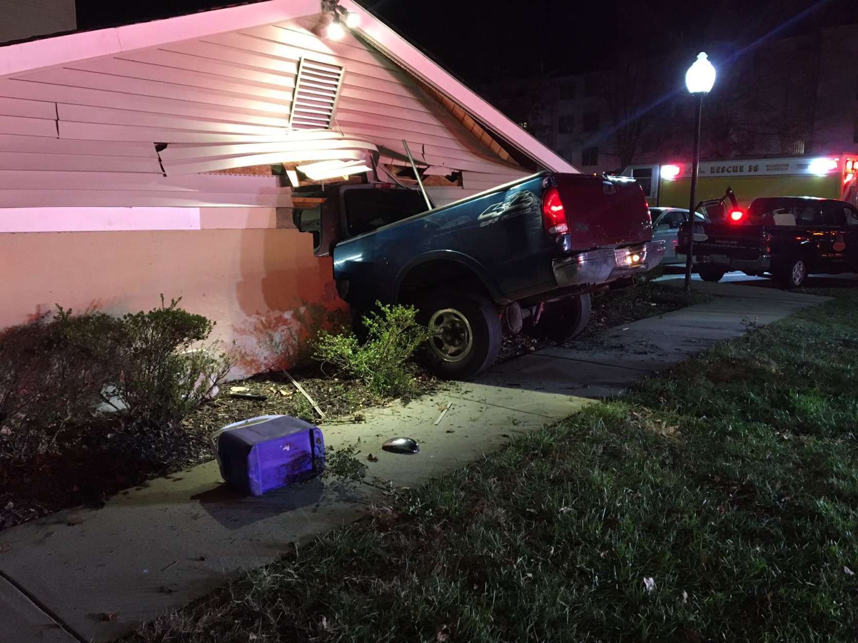 Authorities say two people are being treated for serious injuries after a truck crashed into a house in Anne Arundel County. (Courtesy Annapolis Fire Department)