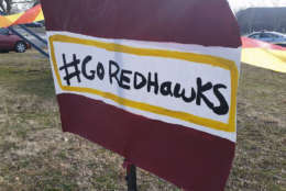 Native-American activists rallying outside the FedEx field in Landover, Maryland, on Sunday have reignited the debate over changing the Washington Redskins football team name. They want the name to be changed to the Redhawks. (WTOP/Kathy Stewart)