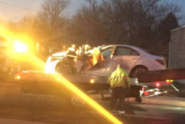 The Mercedes that crashed into the pole on the tow truck. (WTOP/John Domen)