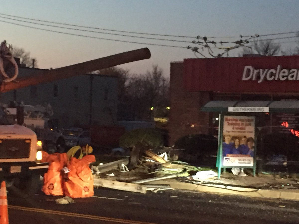 View from the wreck on MD-355 near Gaithersburg. Power crews started work on the new pole as soon as the car was towed from the scene. (WTOP/John Domen)