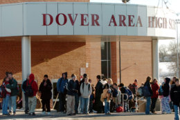 FILE - Students head home after classes ended for the day at Dover Area High School Dec. 20, 2005 in Dover, Pa. This year, eight families upset over "intelligent design" being offered as an alternative to evolution in their high school's biology curriculum ultimately prevailed in a legal challenge that emerged as a key battle in America's culture war. (AP Photo/Bradley C. Bower, file)