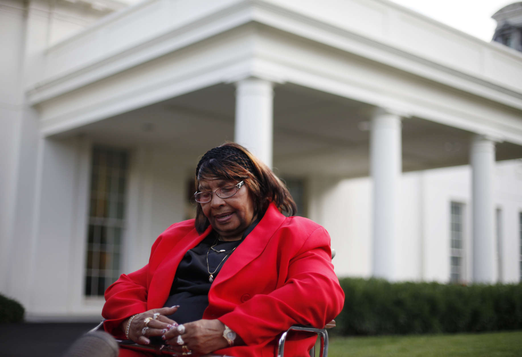 Former baseball player in the Negro League, Mamie 'Peanut' Johnson sits outside the West Wing of the White House in Washington following her meeting with President Barack Obama, Monday, Aug. 5, 2013. White House says Obama invited about a dozen players to the White House to mark their contributions to American history, civil rights and athletics. The players competed for teams like the Philadelphia Stars, New York Black Yankees, Indianapolis Clowns and Boston Blues. (AP Photo/Pablo Martinez Monsivais)