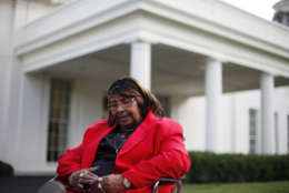 Former baseball player in the Negro League, Mamie 'Peanut' Johnson sits outside the West Wing of the White House in Washington following her meeting with President Barack Obama, Monday, Aug. 5, 2013. White House says Obama invited about a dozen players to the White House to mark their contributions to American history, civil rights and athletics. The players competed for teams like the Philadelphia Stars, New York Black Yankees, Indianapolis Clowns and Boston Blues. (AP Photo/Pablo Martinez Monsivais)