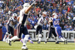 New England Patriots quarterback Tom Brady (12) throws a pass against the Buffalo Bills during the first half of an NFL football game, Sunday, Dec. 3, 2017, in Orchard Park, N.Y. (AP Photo/Adrian Kraus)