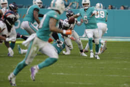 Miami Dolphins quarterback Jay Cutler (6) looks to pass, during the second half of an NFL football game against the Denver Broncos, Sunday, Dec. 3, 2017, in Miami Gardens, Fla. (AP Photo/Lynne Sladky)