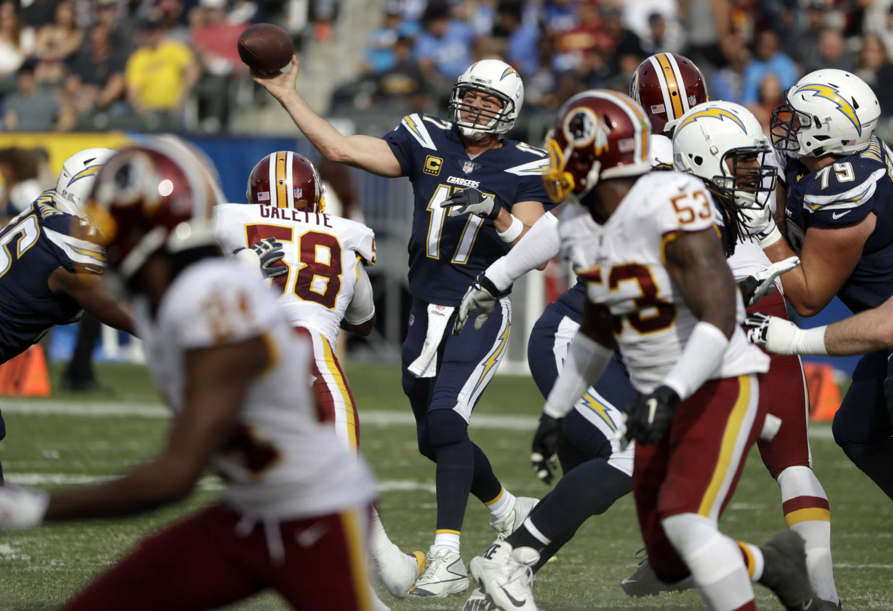 Los Angeles Chargers quarterback Philip Rivers throws a pass during the first half of an NFL football game against the Washington Redskins, Sunday, Dec. 10, 2017, in Carson, Calif. (AP Photo/Alex Gallardo)