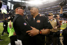 Cincinnati Bengals head coach Marvin Lewis, front right, talks with Minnesota Vikings head coach Mike Zimmer, left, after an NFL football game, Sunday, Dec. 17, 2017, in Minneapolis. (AP Photo/Bruce Kluckhohn)