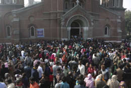Pakistani Christians leave after attending Christmas mass at Sacred Heart Cathedral in Lahore, Pakistan, Monday, Dec. 25, 2017. (AP Photo/K.M. Chaudary)