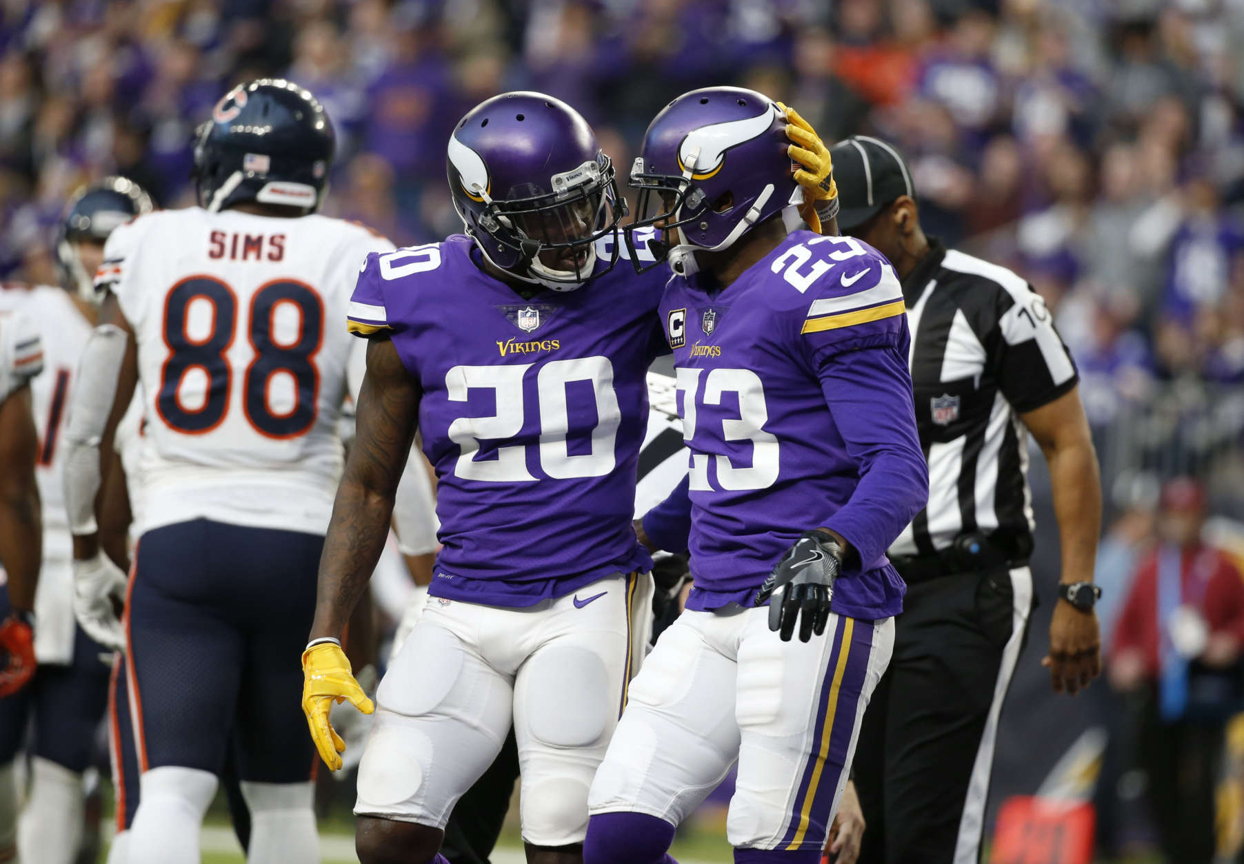 Minnesota Vikings cornerback Mackensie Alexander (20) celebrates with teammate Terence Newman (23) during the second half of an NFL football game against the Chicago Bears, Sunday, Dec. 31, 2017, in Minneapolis. (AP Photo/Bruce Kluckhohn)