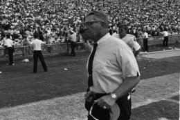 Washington Redskins head coach Vince Lombardi voices his opinion about a play from the sidelines where he made his regular season debut with the team in New Orleans, La., Sept. 21, 1969. Lombardi's expression later changed to a smile as the Redskins beat the New Orleans Saints 26-20. (AP Photo)