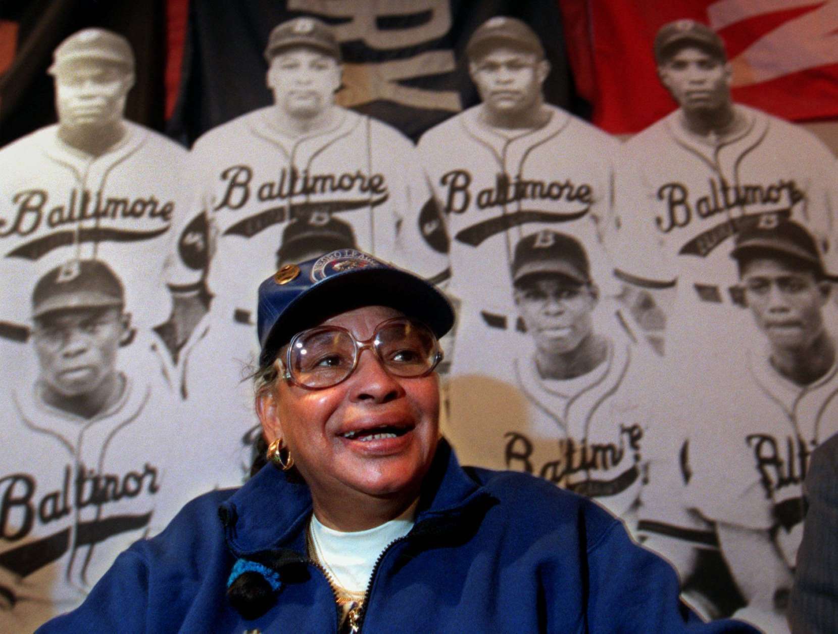 Mamie "Peanuts" Johnson, seen February 14, 1998, at the Babe Ruth Museum in Balitmore, spent hot, dusty summer days playing pickup baseball as a child in the 1940s and dreamed of making the big leagues. Johnson overcame rejection by the all-white women's league that began playing during World War II and became one of only three women to play in the Negro leagues. (AP Photo/Khue Bui)