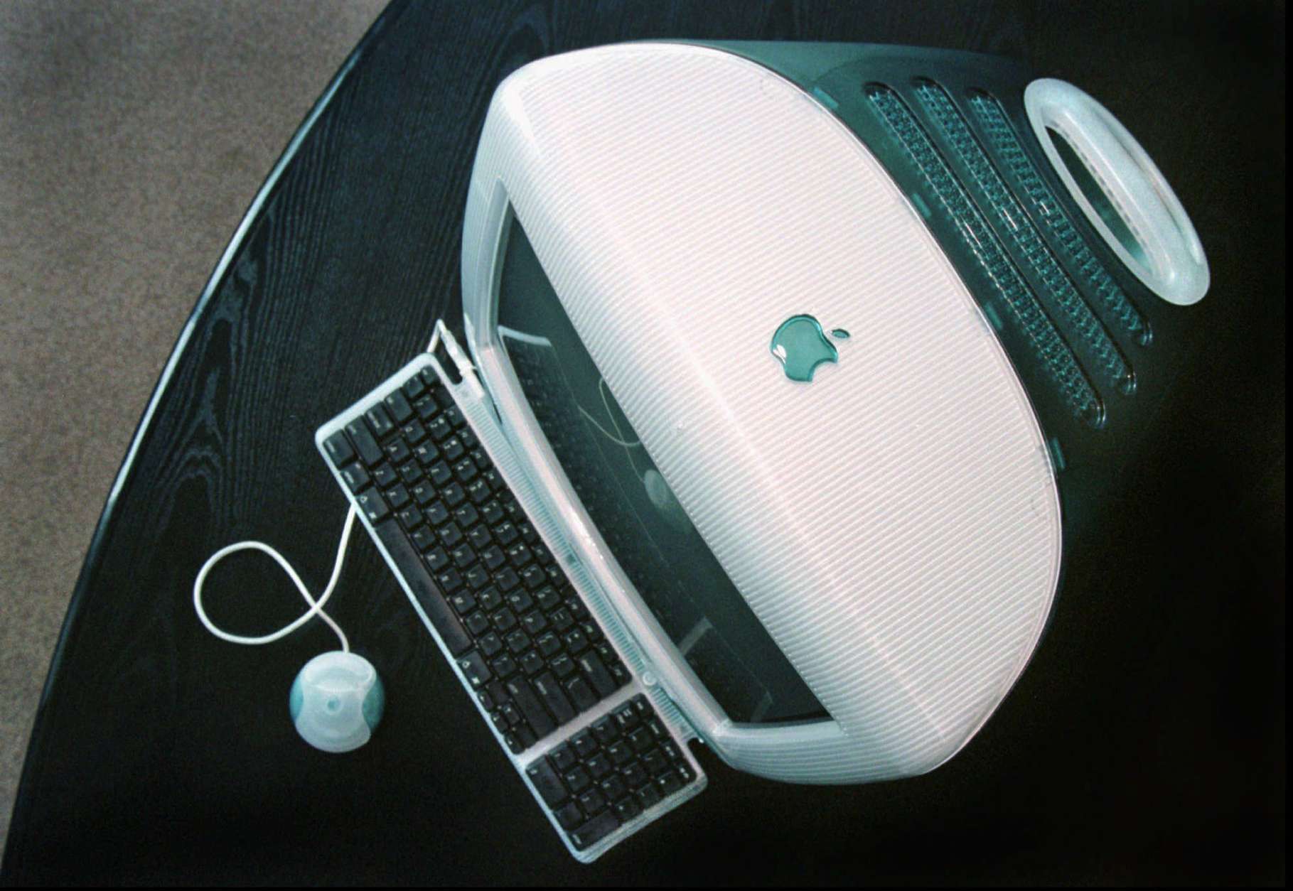 Apple's new iMAC computer is seen Wednesday, Aug. 13, 1998, at Apple headquarters in Cupertino, Calif. The latest Macintosh goes on sale Saturday for $1,299.00, amid high demand from loyal Mac users. Apple said it has received more than 150,000 advance orders the first week it began accepting requests. (AP Photo/Ben Margot)