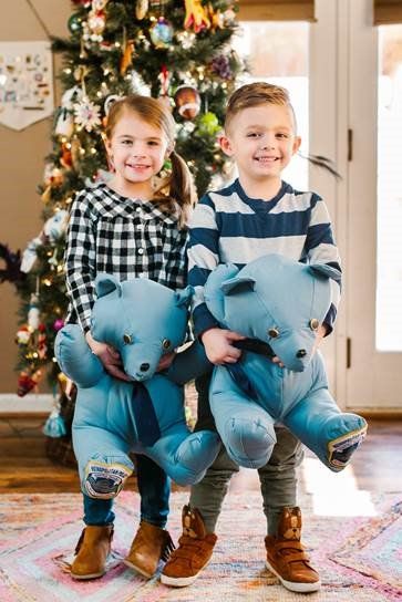 Officer Barry Eastman's kids with the bears made from his uniform. (Courtesy Metropolitan Police Department)