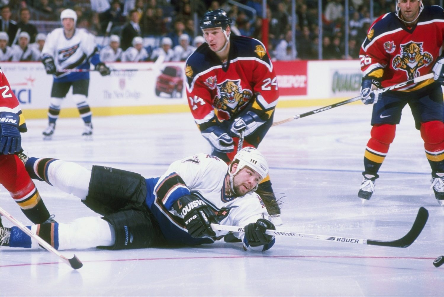 5 Dec 1997:  Chris Simon #17 of the Washington Capitals dives on the ice to shoot during the Capitals 3-2 win over the Florida Panthers at the MCI Center in Washington, D.C. Mandatory Credit: Doug Pensinger  /Allsport