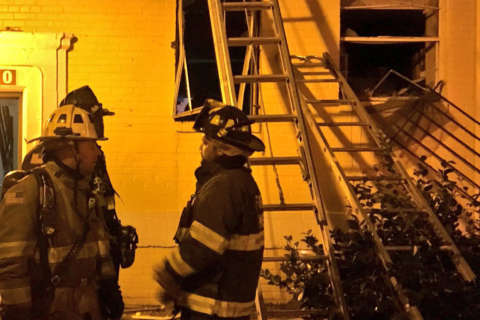 2 women, firefighter injured in apartment fire in NE DC