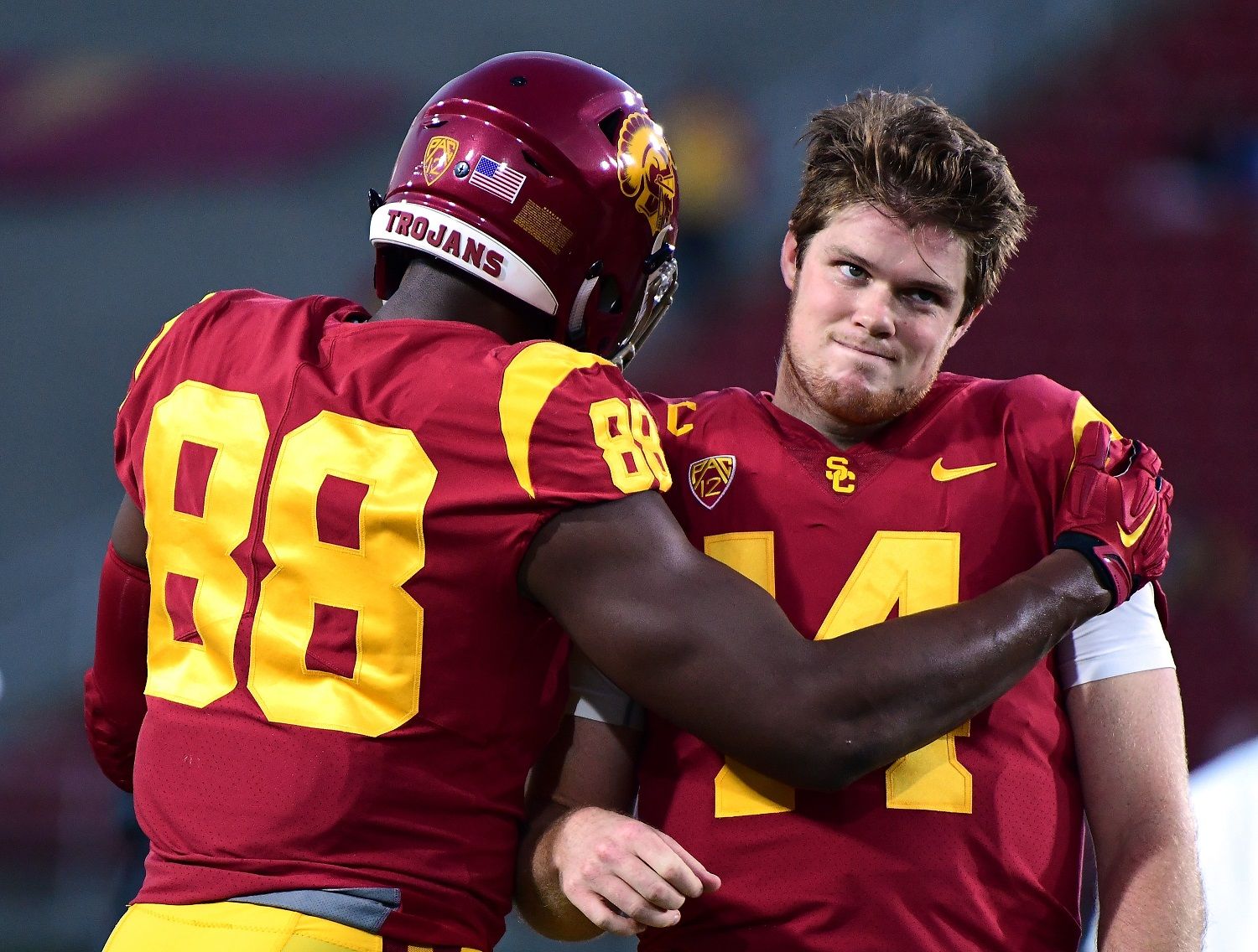 LOS ANGELES, CA - NOVEMBER 18:  Sam Darnold #14 of the USC Trojans jokes with Daniel Imatorbhebhe #88 of the USC Trojans before the game against the UCLA Bruins at Los Angeles Memorial Coliseum on November 18, 2017 in Los Angeles, California.  (Photo by Harry How/Getty Images)