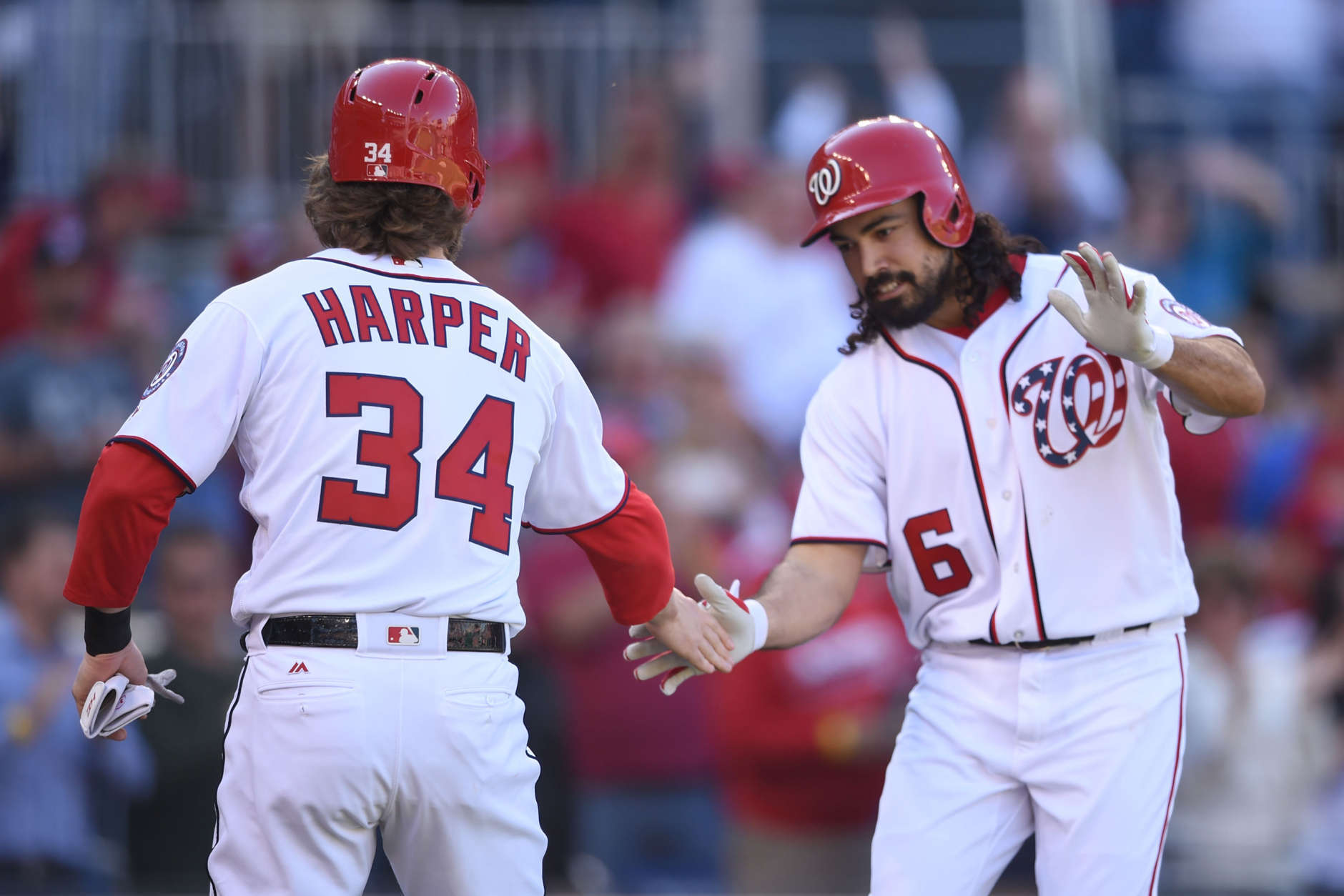 WASHINGTON, DC - OCTOBER 01:  Anthony Rendon #6 of the Washington Nationals celebrates hitting a three run home run in the first inning with Bryce Harper #34 during a baseball game against the Pittsburgh Pirates at Nationals Park on October 1, 2017 in Washington, DC.  (Photo by Mitchell Layton/Getty Images)