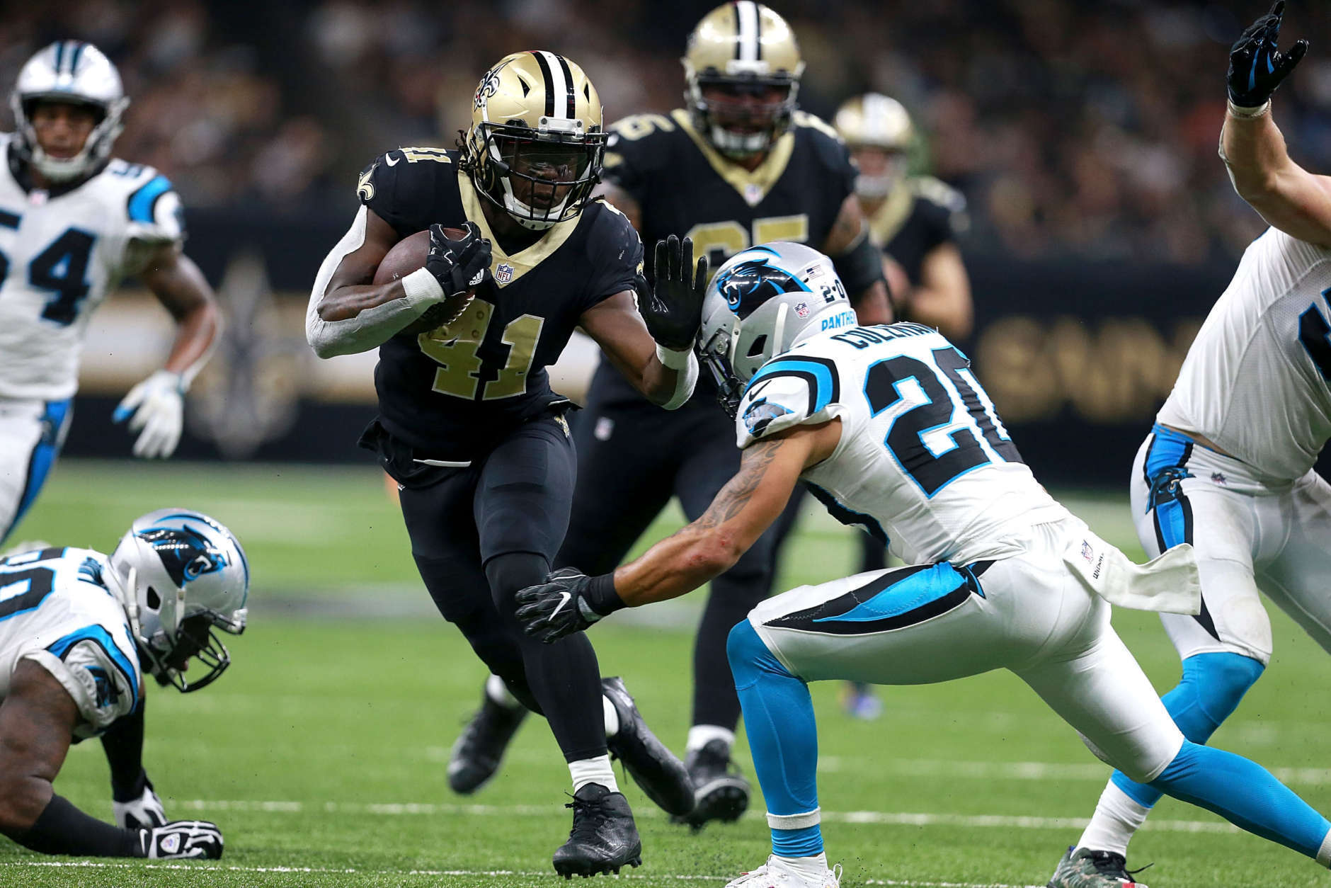 NEW ORLEANS, LA - DECEMBER 03:  Alvin Kamara #41 of the New Orleans Saints runs the ball against the Carolina Panthers during the second half of a NFL game at the Mercedes-Benz Superdome on December 3, 2017 in New Orleans, Louisiana. The New Orleans Saints won the game 31 - 21.  (Photo by Sean Gardner/Getty Images)