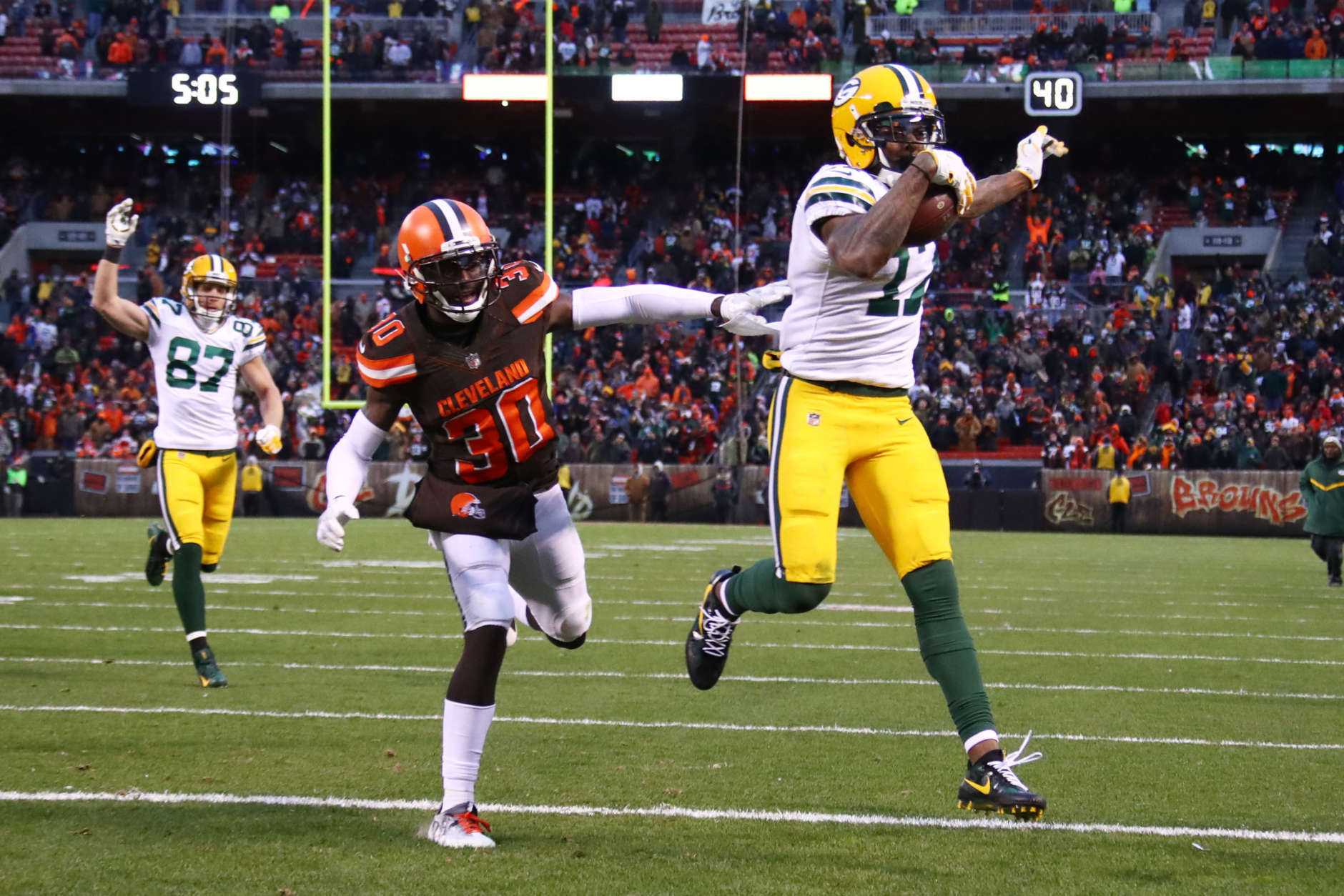 CLEVELAND, OH - DECEMBER 10: Davante Adams #17 of the Green Bay Packers scores the game-winning touchdown in overtime of a 27-21 victory over the Cleveland Browns at FirstEnergy Stadium on December 10, 2017 in Cleveland, Ohio. (Photo by Gregory Shamus/Getty Images)