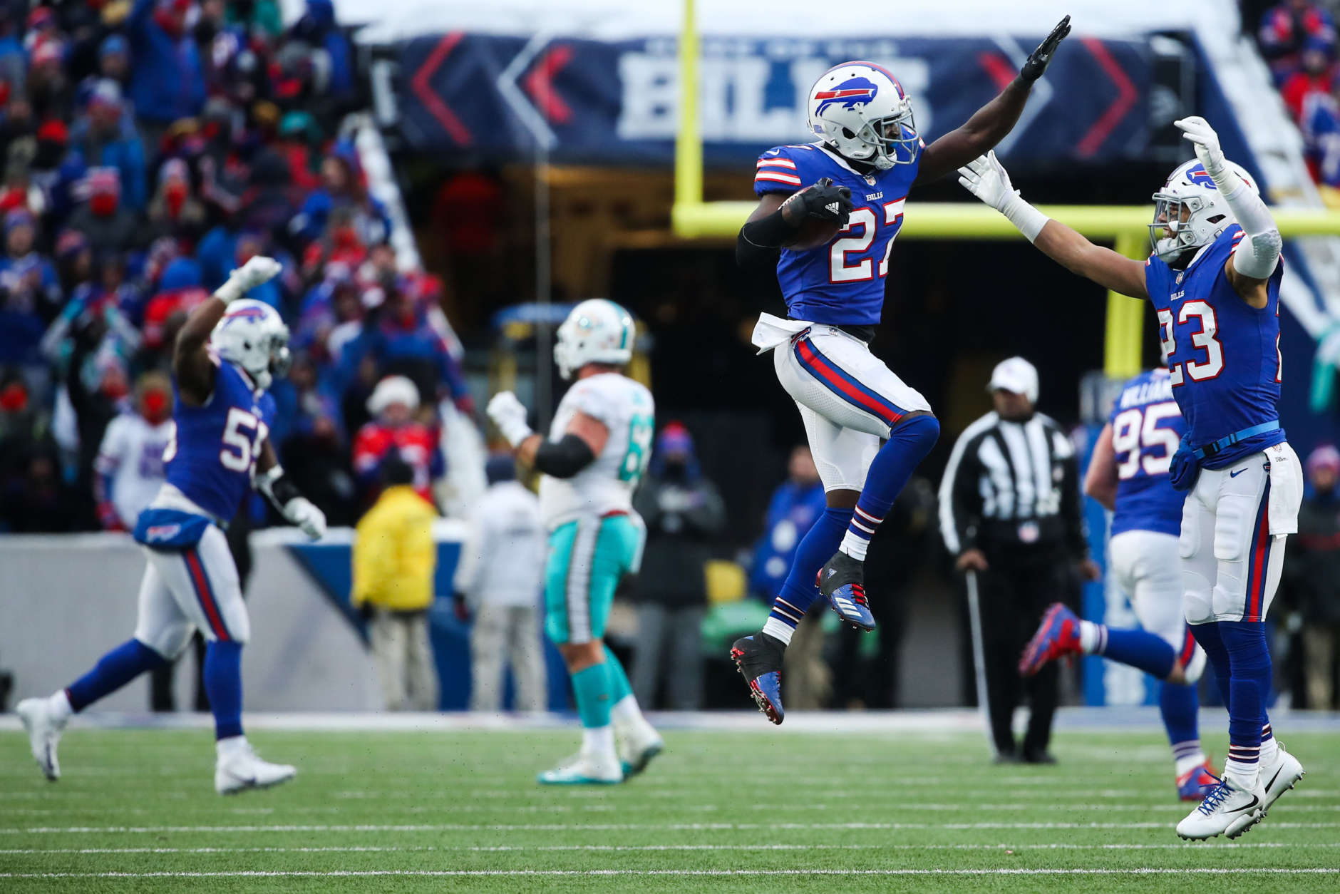 ORCHARD PARK, NY - DECEMBER 17:  Tre'Davious White #27 of the Buffalo Bills celebrates after intercepting the ball during the fourth quarter to win the game against the Miami Dolphins on December 17, 2017 at New Era Field in Orchard Park, New York.  (Photo by Tom Szczerbowski/Getty Images)