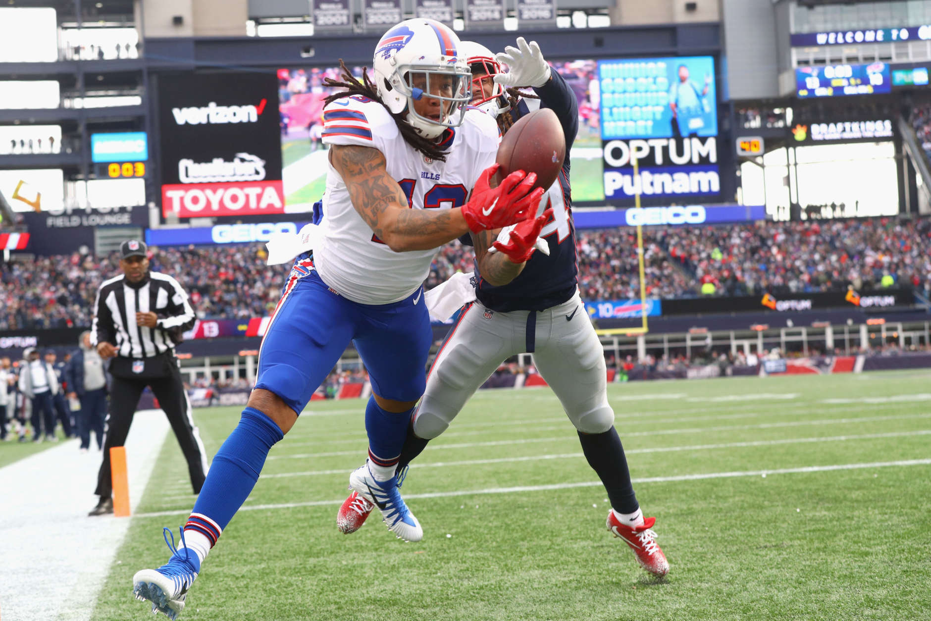 FOXBORO, MA - DECEMBER 24:  Kelvin Benjamin #13 of the Buffalo Bills catches a touchdown pass as he is defended by Stephon Gilmore #24 of the New England Patriots during the quarter of a game against the Buffalo Bills at Gillette Stadium on December 24, 2017 in Foxboro, Massachusetts. The touchdown was reversed after an official review.  (Photo by Maddie Meyer/Getty Images)