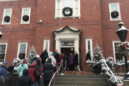 Guests wait outside the Government House, an 1870 Georgian-style mansion that serves as the Governor's Mansion in Annapolis, Maryland. (WTOP/Dick Uliano)