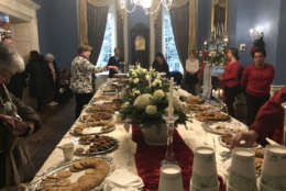 The chefs at Government House were pretty busy with the long table in the state dining room laden with sweet treats including cookies, brownies and other desserts. (WTOP/Dick Uliano)