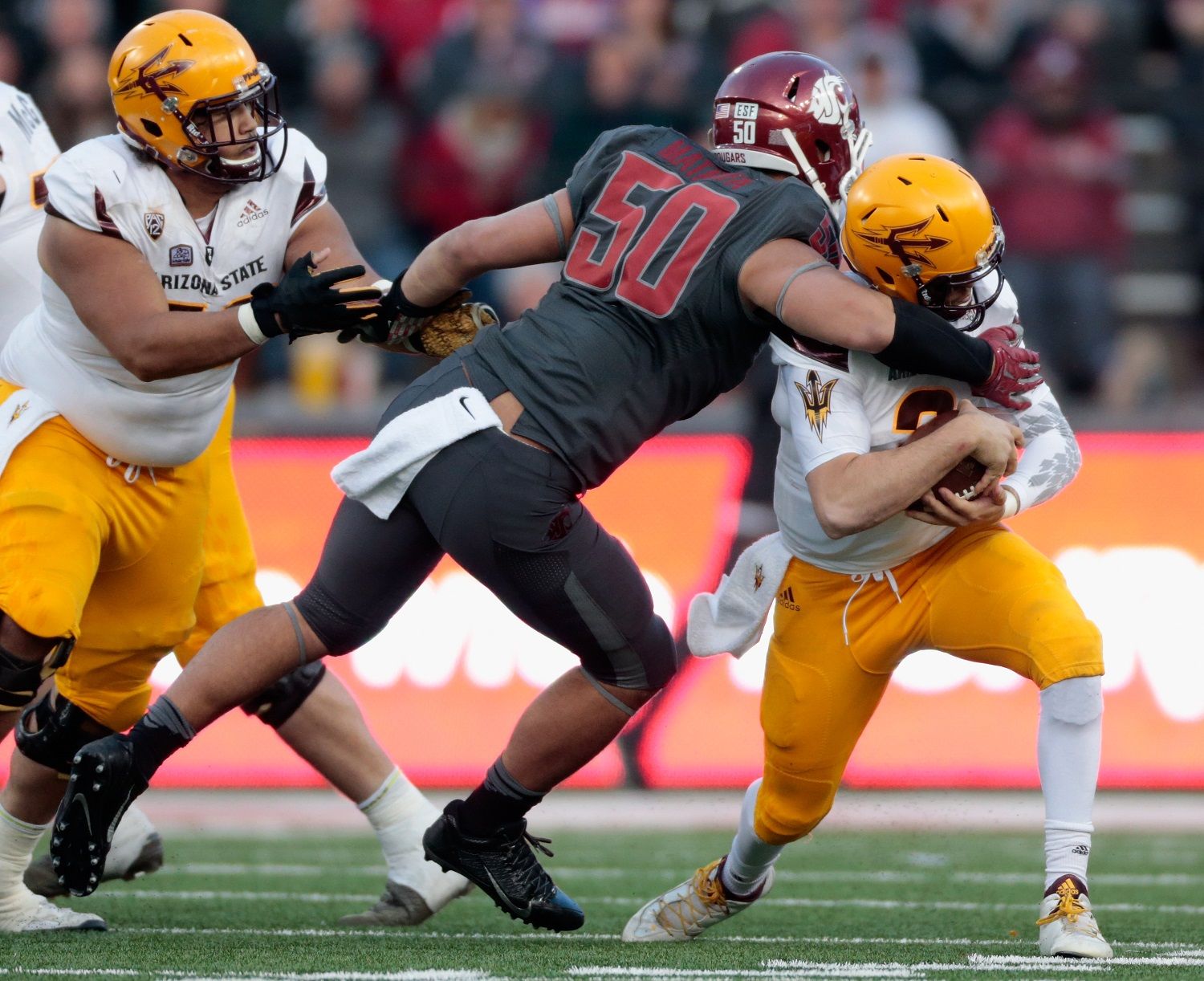 PULLMAN, WA - NOVEMBER 07:  Mike Bercovici #2 of the Arizona State Sun Devils is sacked by Hercules Mata'afa #50 of the Washington State Cougars in the second half at Martin Stadium on November 7, 2015 in Pullman, Washington.  Washington State defeated Arizona State 38-24.  (Photo by William Mancebo/Getty Images)