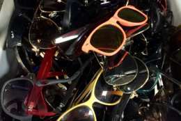 Here are the many sunglasses that are often left behind at TSA security checkpoints. (Courtesy TSA/Lisa Farbstein)