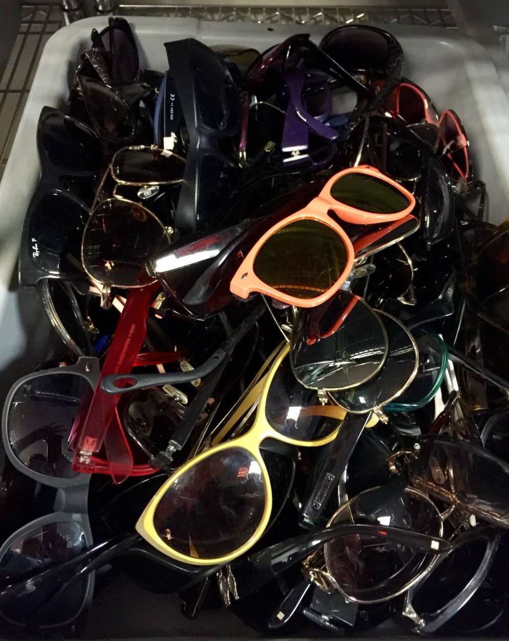Here are the many sunglasses that are often left behind at TSA security checkpoints. (Courtesy TSA/Lisa Farbstein)